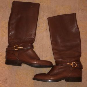 Brown leather boots with gold buckle